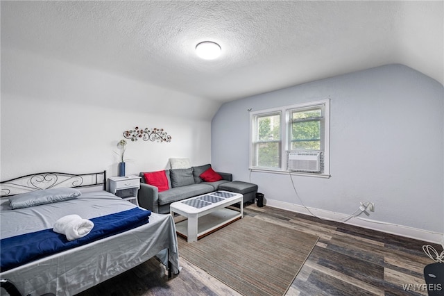 2776 Forest Ave, Niagara Falls, NY 14303 - bedroom with lofted ceiling, wood finished floors, and a textured ceiling