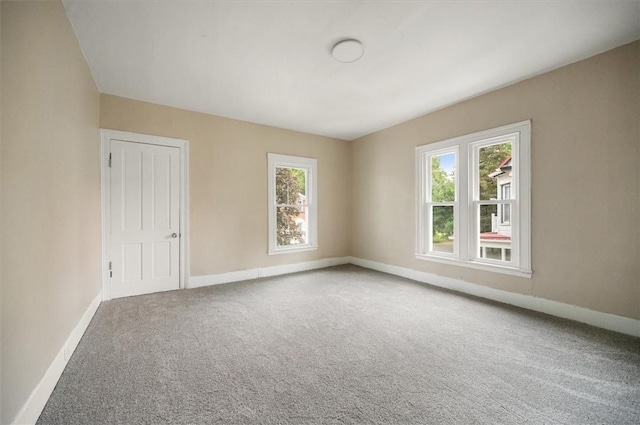 37 Nelson St, Auburn, NY 13021 - carpeted empty room featuring baseboards