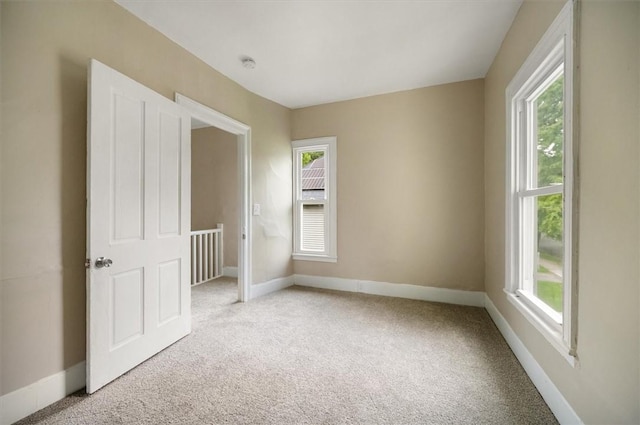 37 Nelson St, Auburn, NY 13021 - unfurnished bedroom with multiple windows and carpet