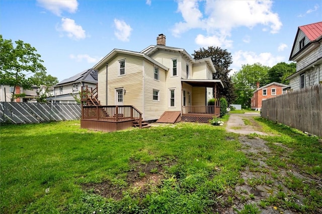 37 Nelson St, Auburn, NY 13021 - rear view of house with a chimney and a deck