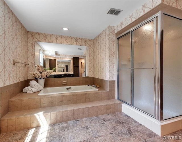 44 Deer Run, Amherst, NY 14221 - bathroom featuring a shower stall, a bath, and wallpapered walls