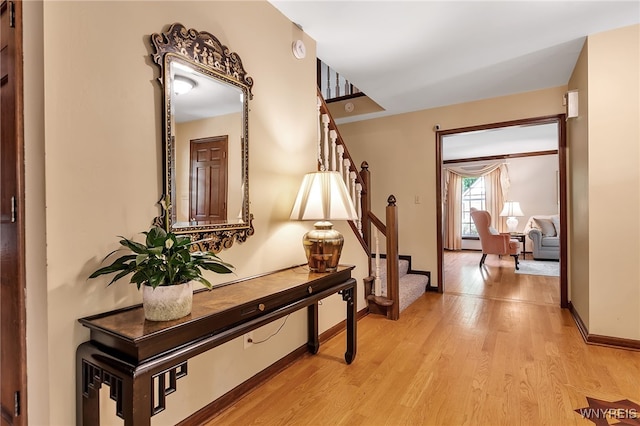 44 Deer Run, Amherst, NY 14221 - hall featuring stairs and light wood finished floors