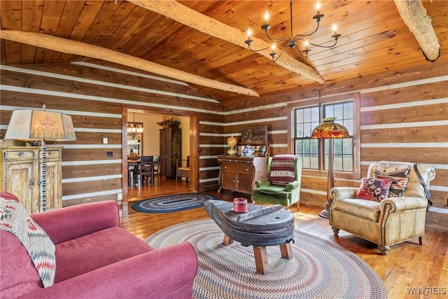 8345 Lapp Rd, Clarence, NY 14051 - living room with wooden walls, wooden ceiling, hardwood / wood-style flooring, and a chandelier