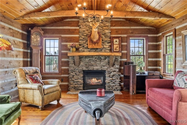 8345 Lapp Rd, Clarence, NY 14051 - living room with wood-type flooring, wood walls, wooden ceiling, and a stone fireplace