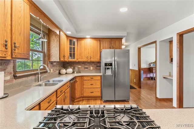 8345 Lapp Rd, Clarence, NY 14051 - kitchen featuring appliances with stainless steel finishes, light countertops, light wood-style flooring, wainscoting, and recessed lighting