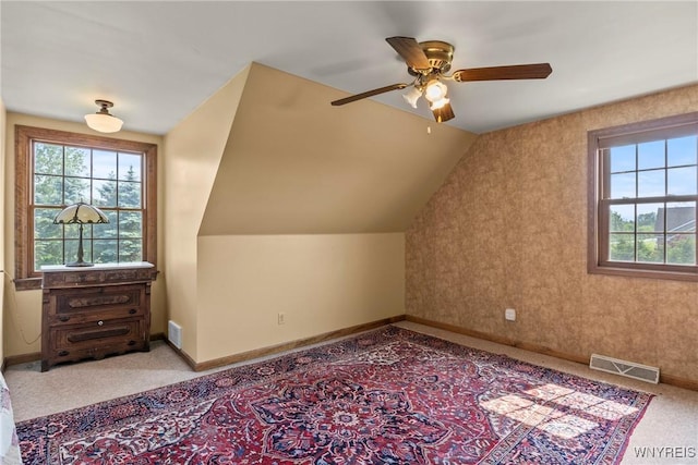 8345 Lapp Rd, Clarence, NY 14051 - bonus room with plenty of natural light, a ceiling fan, light carpet, and lofted ceiling