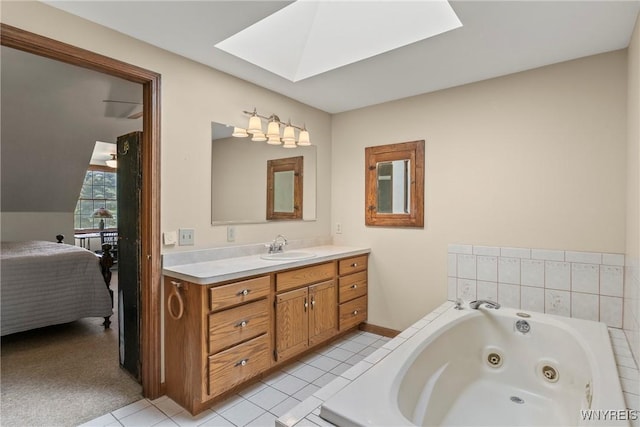 8345 Lapp Rd, Clarence, NY 14051 - ensuite bathroom with a skylight, vanity, a tub with jets, and tile patterned flooring