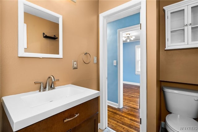55 Spruce Rd, Amherst, NY 14226 - half bathroom featuring vanity and wood finished floors