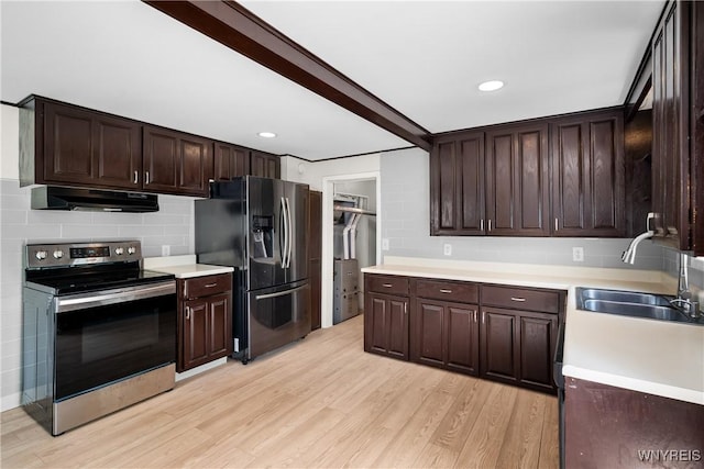 55 Spruce Rd, Amherst, NY 14226 - kitchen featuring stainless steel appliances, under cabinet range hood, light wood-style flooring, dark brown cabinetry, and recessed lighting