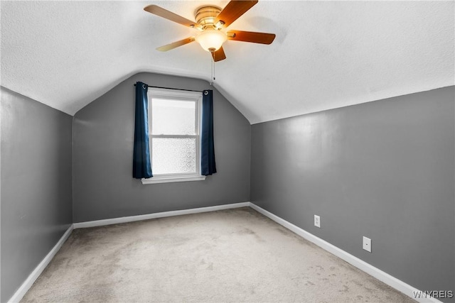 55 Spruce Rd, Amherst, NY 14226 - bonus room featuring ceiling fan, lofted ceiling, carpet, and a textured ceiling