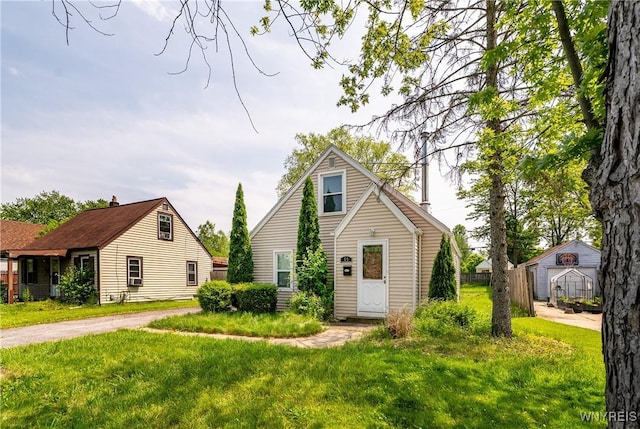 55 Spruce Rd, Amherst, NY 14226 - view of front facade featuring a front yard