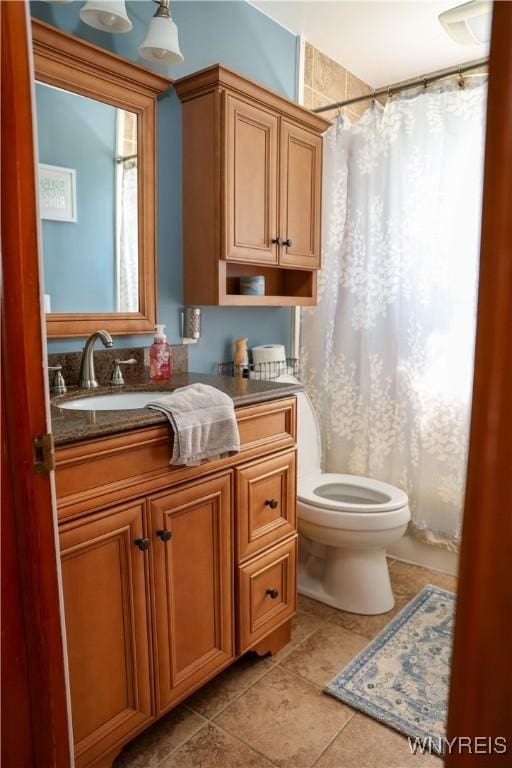 1422 Master St, North Tonawanda, NY 14120 - bathroom with tile patterned flooring, vanity, and curtained shower