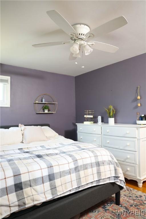 1422 Master St, North Tonawanda, NY 14120 - bedroom with a ceiling fan and wood finished floors
