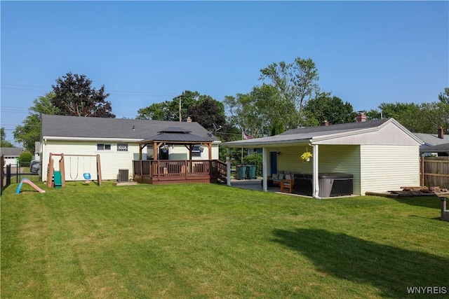1422 Master St, North Tonawanda, NY 14120 - back of property featuring a gazebo, a hot tub, and a patio