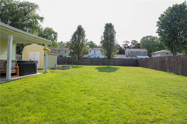 1422 Master St, North Tonawanda, NY 14120 - fenced backyard with a storage shed and a hot tub