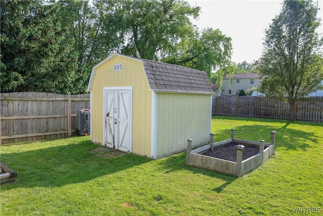1422 Master St, North Tonawanda, NY 14120 - view of shed featuring a fenced backyard and a garden