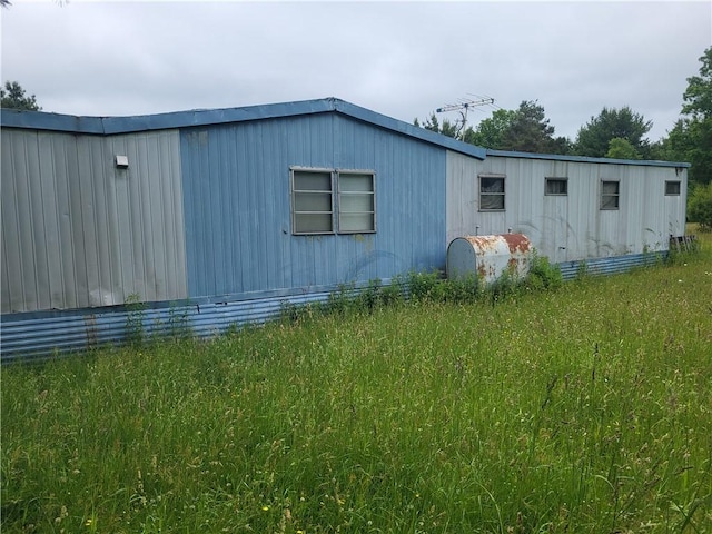 9824 County Route 114th Rd Unit 2, Wayne, NY 14840 - view of side of property with oil tank