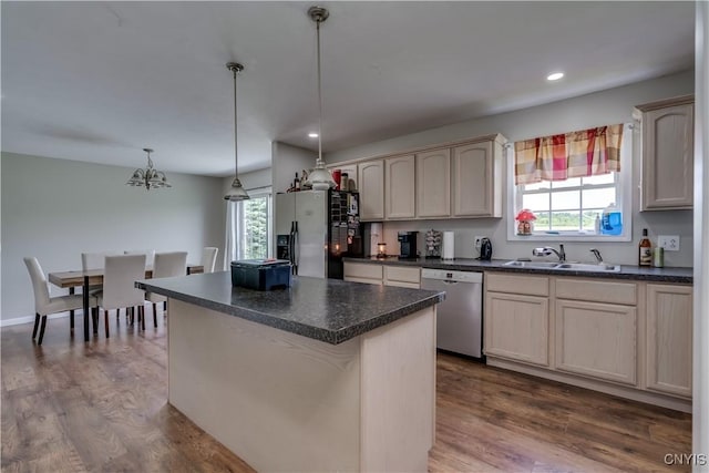 30656 Nys Route 37, Le Ray, NY 13637 - kitchen featuring appliances with stainless steel finishes, dark countertops, plenty of natural light, dark wood finished floors, and recessed lighting