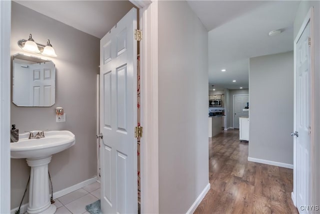 30656 Nys Route 37, Le Ray, NY 13637 - bathroom featuring recessed lighting and wood finished floors