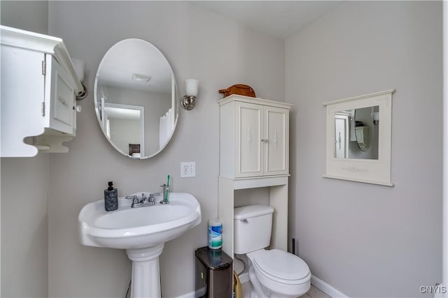30656 Nys Route 37, Le Ray, NY 13637 - bathroom with baseboards and toilet