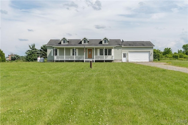 30656 Nys Route 37, Le Ray, NY 13637 - view of front of property with driveway, a porch, an attached garage, and a front lawn