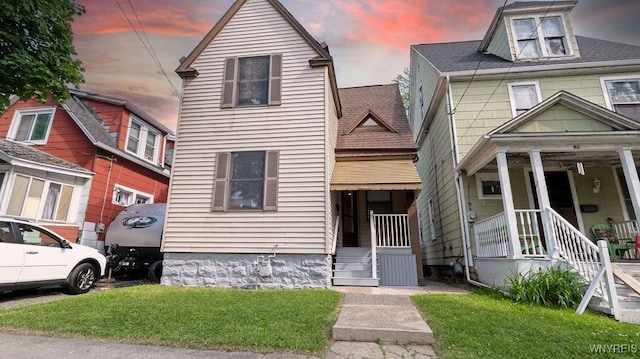 63 Briggs Ave, Buffalo, NY 14207 - view of front of home featuring a front lawn and a porch