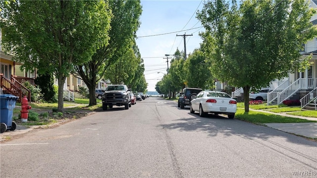 63 Briggs Ave, Buffalo, NY 14207 - view of asphalt street with sidewalks, stairs, and curbs