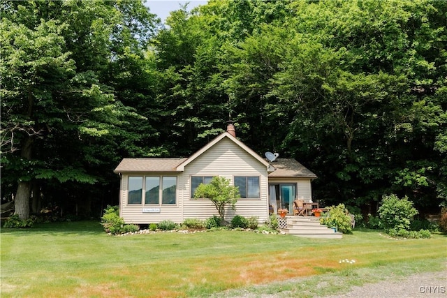 3271 Lanning Rd, Spafford, NY 13152 - view of front of home with a front yard and a chimney