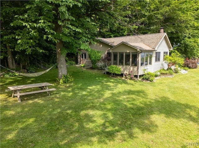 3271 Lanning Rd, Spafford, NY 13152 - view of grassy yard with a sunroom