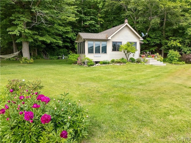 3271 Lanning Rd, Spafford, NY 13152 - view of grassy yard featuring a sunroom