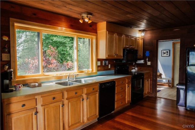 3271 Lanning Rd, Spafford, NY 13152 - kitchen featuring black appliances, wooden ceiling, dark wood-style flooring, light countertops, and wood walls