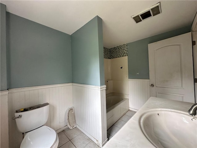 55 Maple St, Canisteo, NY 14823 - full bathroom featuring a wainscoted wall, tile patterned flooring, bathing tub / shower combination, and vanity