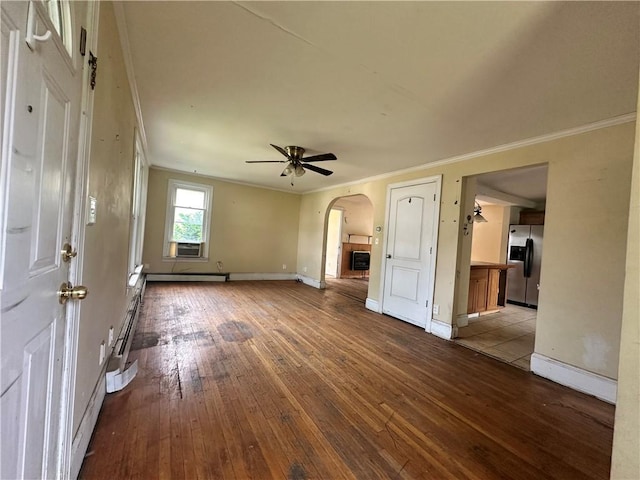 55 Maple St, Canisteo, NY 14823 - unfurnished room with crown molding, arched walkways, hardwood / wood-style flooring, ceiling fan, and a baseboard radiator