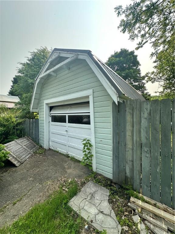55 Maple St, Canisteo, NY 14823 - detached garage featuring driveway
