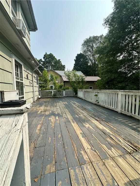 55 Maple St, Canisteo, NY 14823 - wooden deck with cooling unit