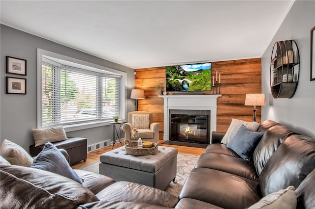 847 Starin Ave, Tonawanda-Town, NY 14223 - living area featuring a fireplace with flush hearth and wood finished floors