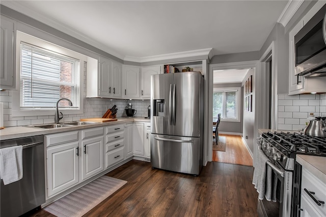 847 Starin Ave, Tonawanda-Town, NY 14223 - kitchen with stainless steel appliances, backsplash, light countertops, dark wood-style floors, and white cabinetry