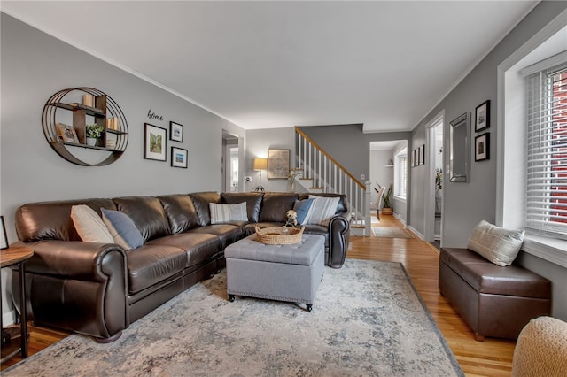 847 Starin Ave, Tonawanda-Town, NY 14223 - living room with stairs, wood finished floors, and crown molding