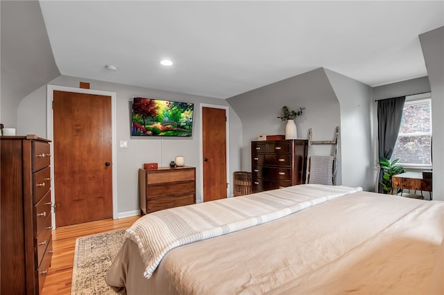 847 Starin Ave, Tonawanda-Town, NY 14223 - bedroom with light wood-style flooring, vaulted ceiling, and recessed lighting