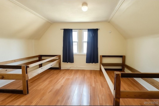 165 Leroy Ave, Buffalo, NY 14214 - additional living space with lofted ceiling and light wood-style flooring