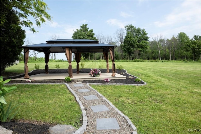 4244 County Line Rd, Skaneateles, NY 13152 - surrounding community with a gazebo, a lawn, and a patio area