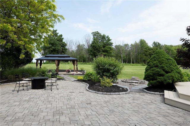 4244 County Line Rd, Skaneateles, NY 13152 - view of patio / terrace with a gazebo and a fire pit