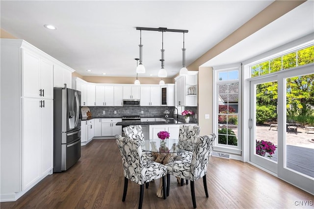 4244 County Line Rd, Skaneateles, NY 13152 - dining area featuring dark wood finished floors and recessed lighting