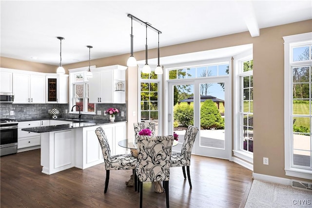 4244 County Line Rd, Skaneateles, NY 13152 - dining area featuring dark wood finished floors
