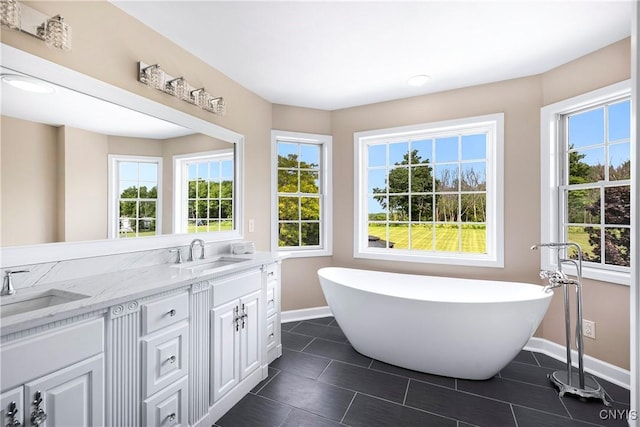 4244 County Line Rd, Skaneateles, NY 13152 - full bathroom featuring plenty of natural light, tile patterned floors, and a soaking tub