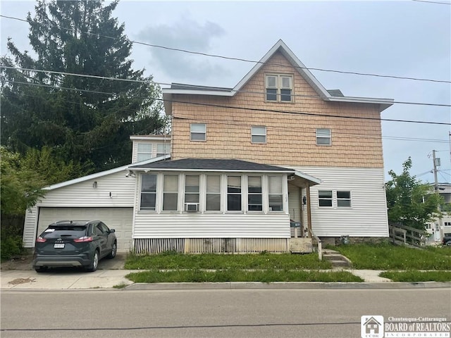 102 Broadhead Ave, Jamestown, NY 14701 - view of front of home with driveway, an attached garage, and roof with shingles