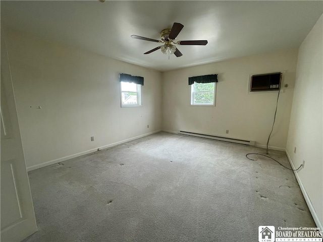 102 Broadhead Ave, Jamestown, NY 14701 - empty room featuring baseboard heating, carpet floors, a ceiling fan, and a wall mounted air conditioner