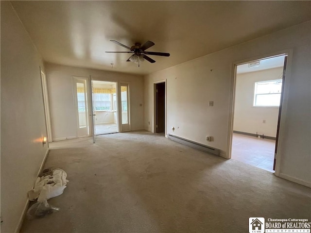 102 Broadhead Ave, Jamestown, NY 14701 - empty room with baseboard heating, a ceiling fan, and light colored carpet