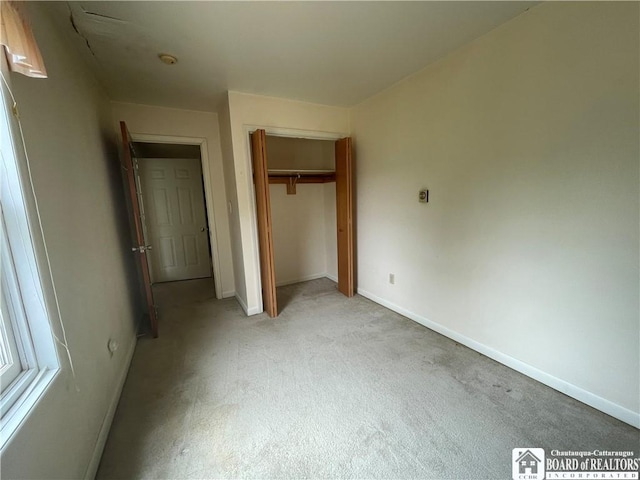 102 Broadhead Ave, Jamestown, NY 14701 - unfurnished bedroom featuring light carpet and a closet