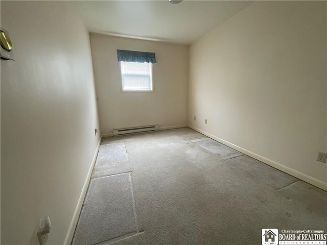 102 Broadhead Ave, Jamestown, NY 14701 - carpeted empty room featuring a baseboard radiator and baseboards